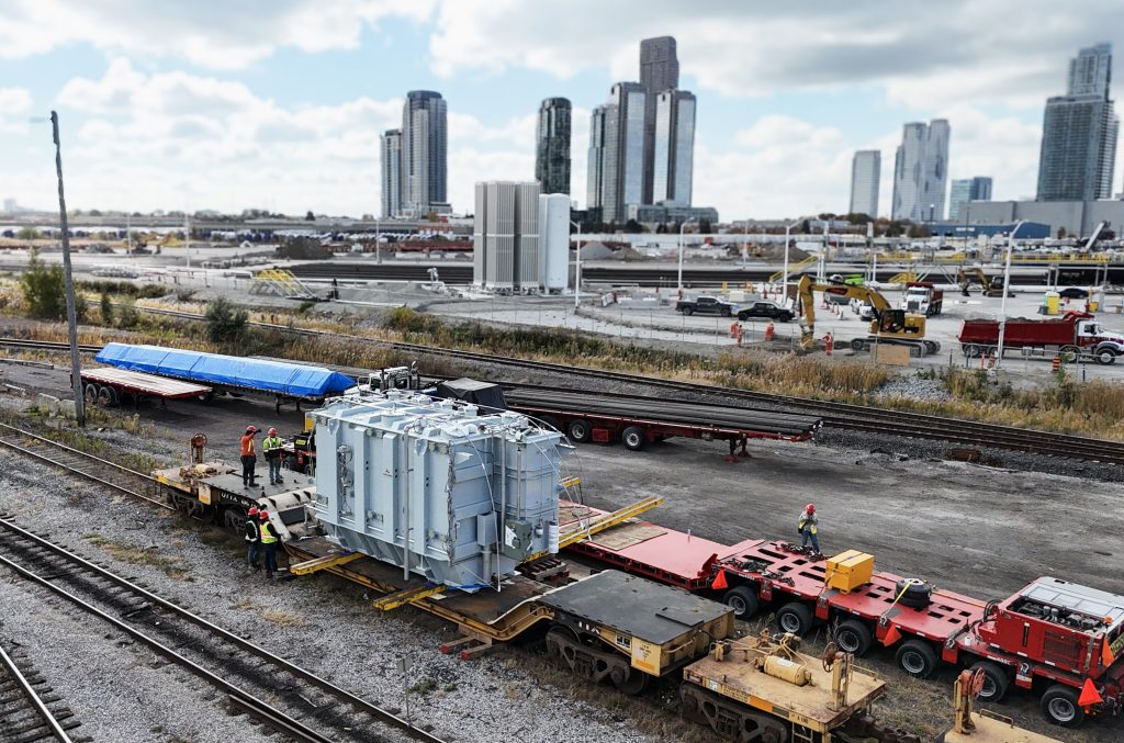 Scott-Woods specialized transportation team supporting transformer installation using advanced jack and slide equipment. showing the range of our heavy haul fleet. Top choice of hydro & utility transportation