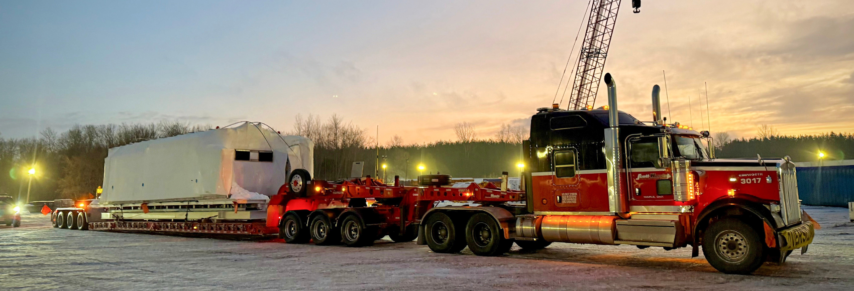 Scott-Woods heavy haul transportation moving oversized modular equipment during spring thaw season